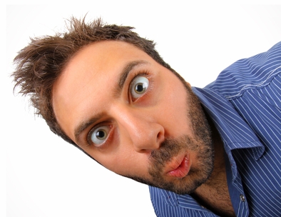 Surprised boy on white background