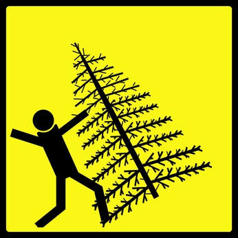 Warning sign for a Christmas tree falling over