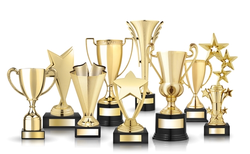 Set of golden trophies. Isolated on white background